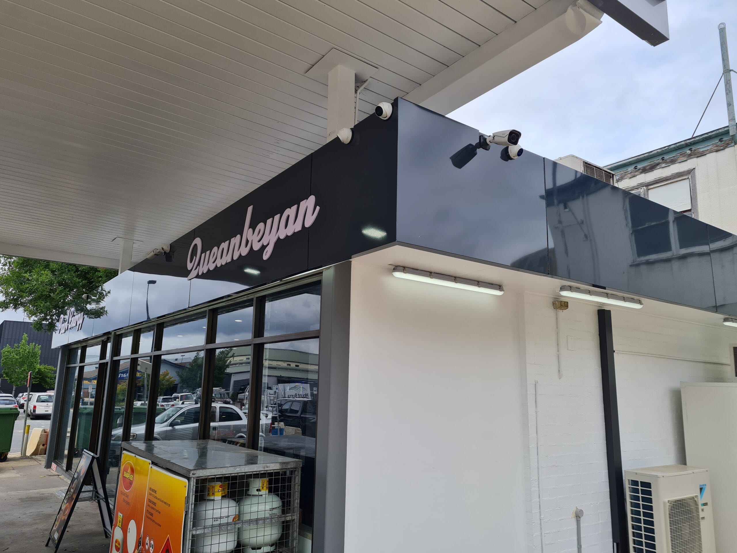 Petrol station CCTV cameras installed for night monitoring of fuel pumps and external vehicle areas